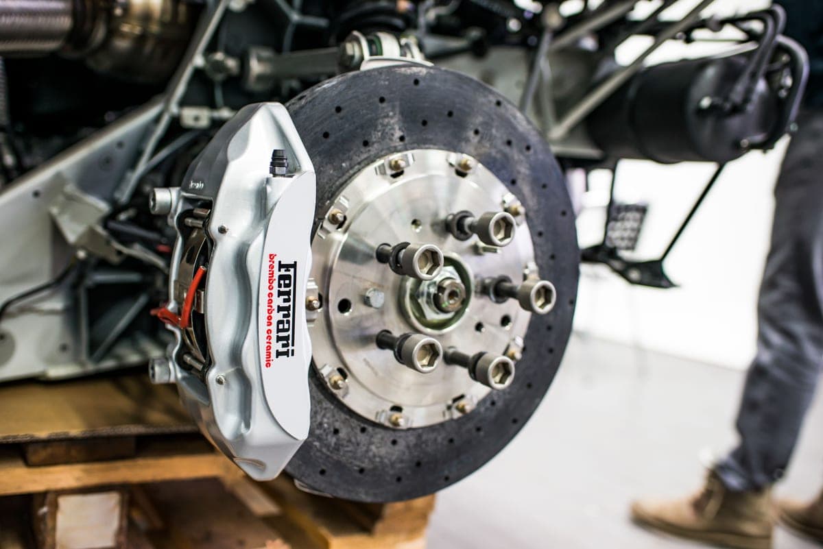 Detailed view of a disc brake and caliper on a car