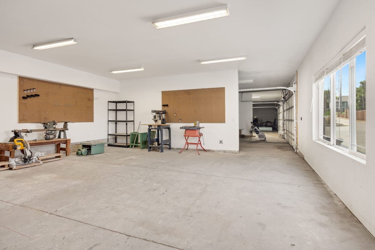 A bright industrial workshop with machinery and tools